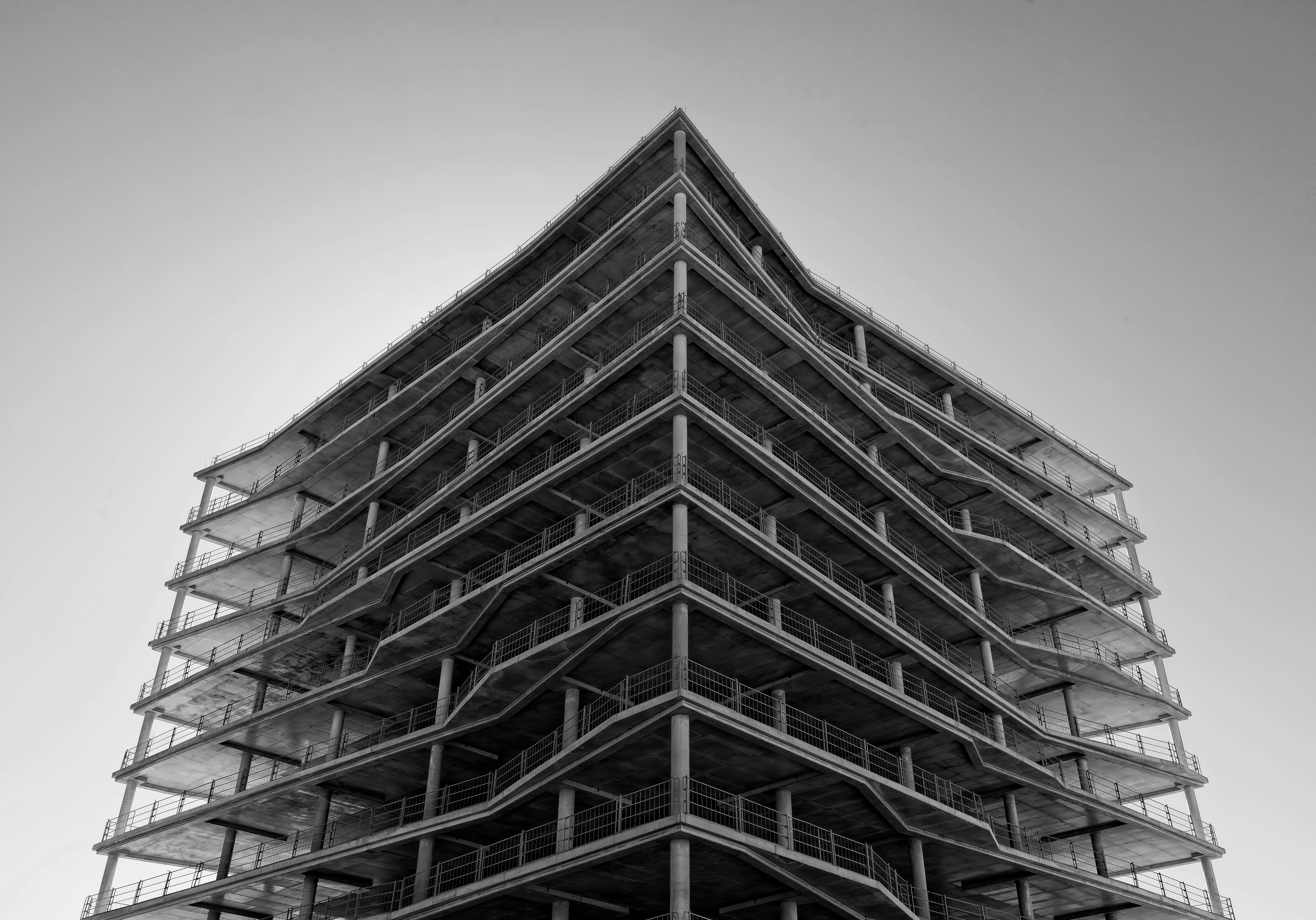 Cover image for the post. Grayscale photo of a building. Photo taken by Ricardo Gomez Angel.