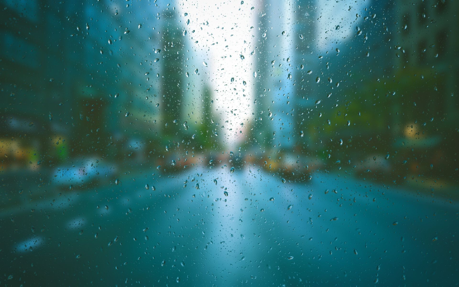 Cover image for the post. Blurred city scene through raindrop-covered window, creating a tranquil urban mood. Photo downloaded from Pixabay.